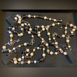CHANEL Faux Pearl Necklace with black beading and crystal inlay CC Logos